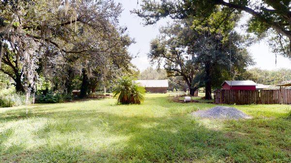 Morning view of barn across the road from this affordable, move in ready home in Auburndale