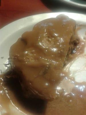 Hot roast beef sandwich with mashed potatoes covered in gravy