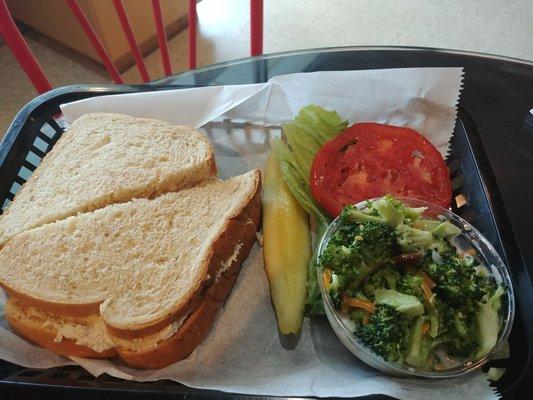 Chicken salad sandwich with broccoli salad