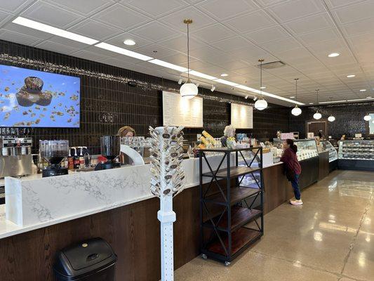 Interior with fresh ground coffee, beautiful espresso machine, toffee, chocolate, ice cream!