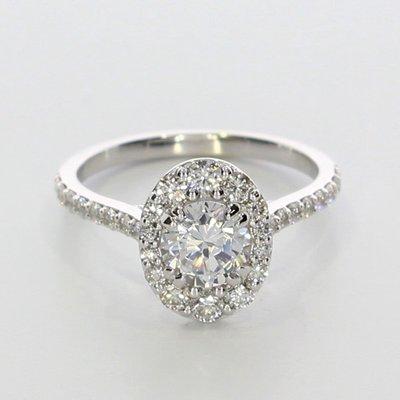 Maxine - a halo setting those who want the brilliance & sparkle of a round diamond with the shape of an oval