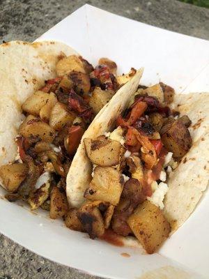 Breakfast tacos with chorizo, eggs, potatoes, and peppers