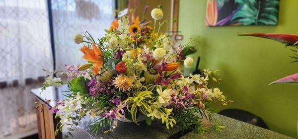 Locally sourced spring and tropical blooms