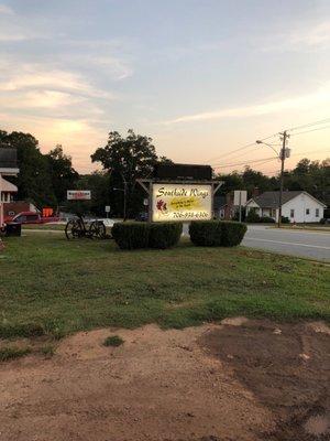 Here's their sign. The driveway for the drive through is behind that sign.