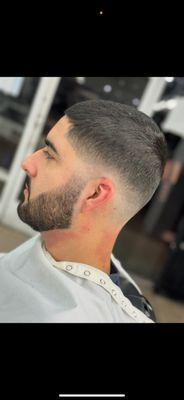 Men's medium fade haircut and beard cut