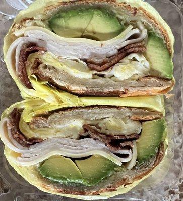 Turkey, Bacon, Avocado, Egg, and Cheese croissant