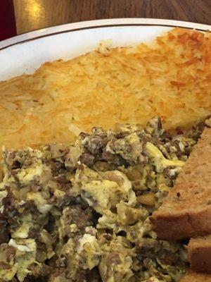 Housa eggs, hash browns & rye toast