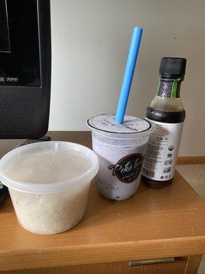 Taro Milk Tea size comparison with their side of sushi rice and a soy sauce bottle.