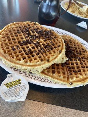 Chocolate chip waffles with syrup and their butter