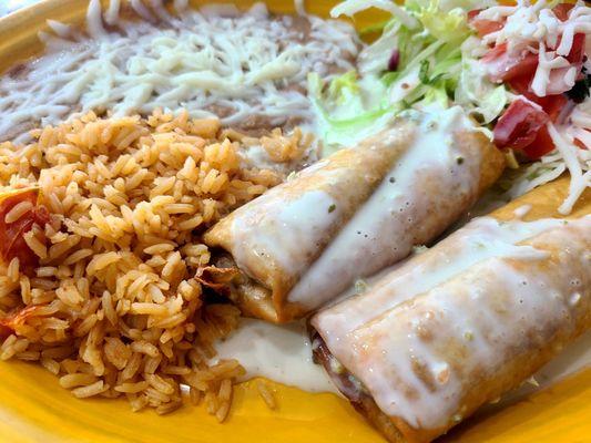 GRANDE BURRITO - Chimichanga ("Hard" & with Beef option) served w/ Rice and Refried Beans (Side option)