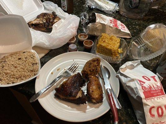 Jerk Chicken, Fried Chicken, rice, Mac n' cheese, Beef and chicken patties.  I mean, come on!!!