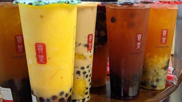 Pictured: Passion GT Boba, Mango Yogurt Boba, Earl Grey 3Js, Lemon Wintermelon Basil Seed Herbal Jelly, Strawberry GT Boba, and QQ Passion.