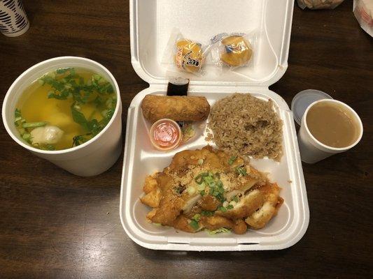 Almond boneless chicken, fried rice, egg roll, wonton soup, and gravy on the side.  Came with two fortune cookies too!