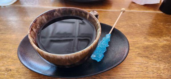 Cup of coffee with a candy sugar stick $5.99