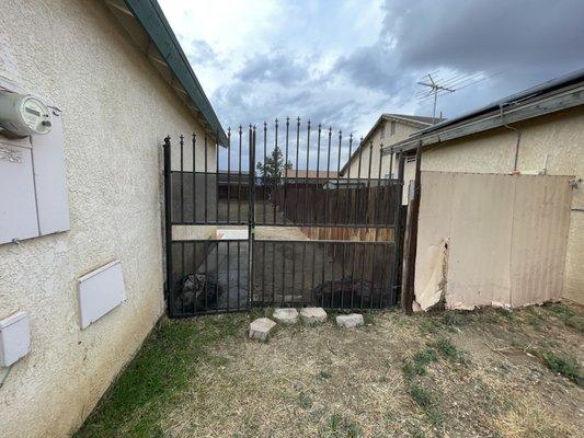 Before: rusted gate. Had to lift gate to use finger latch and lock