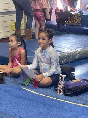 Sammy. My 6 yr old loving her gym and coach and friends.