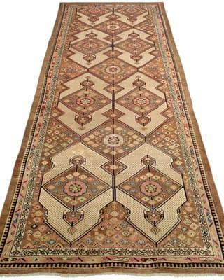 Claremont Rug Company offers breathtaking antique Oriental rugs.  (Serab Camelhair, 19th century)