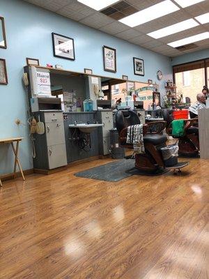 There are two chairs and sometimes two barbers. Today, just one. Tina.