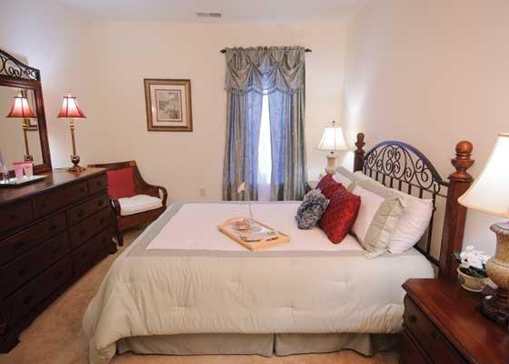 The bedroom in an apartment in our senior living community in Williamsburg.