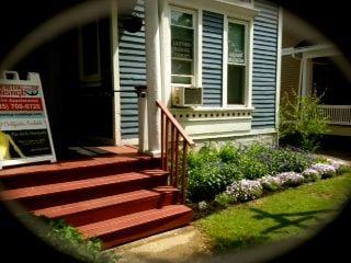 Ready for summer - mulch down, flower baskets made and hung :)