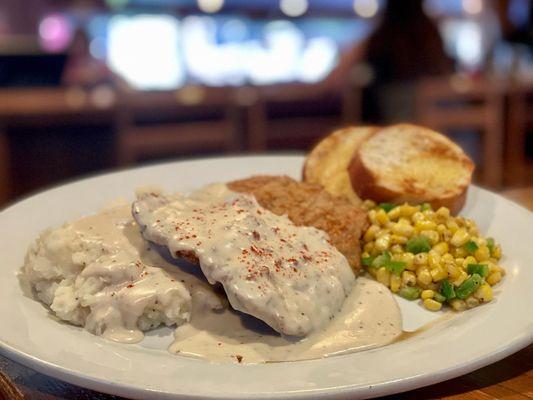 Wednesday Special-Chicken Fried Steak, country gravy, jalapeno corn and garlic bread.