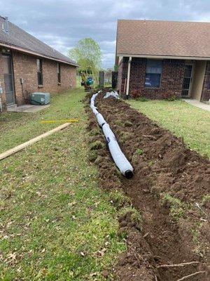 New French drain being installed.