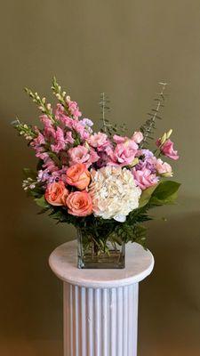 Colorful High-end flowers in a vase heading out for daily delivery.