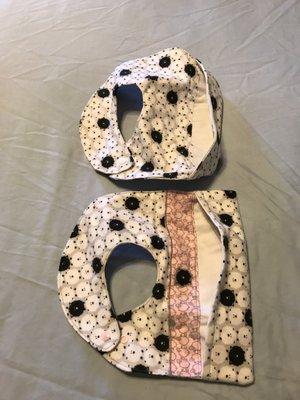 Baby bibs with coated cloth "catch trays".