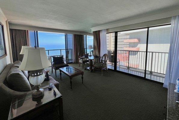 Corner Ocean Front Suite: Living Room with Sofa Bed