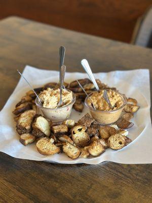 Pretzel chips with pimento cheese dip and red pepper hummus