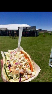 Chicken kabob Gyro with the "Works' as we say back east. VERRY refreshing option at a festival. Head towards the food trucks!