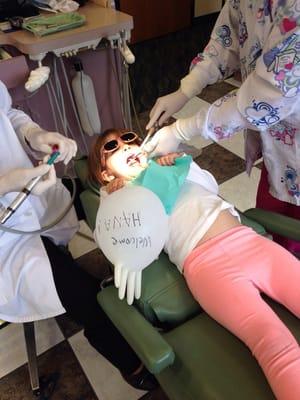 My adorable daughter actually enjoying the dentist!