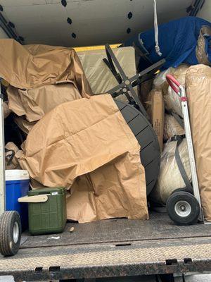 Not a container move - you can see my patio table not wrapped at all. The patio chairs to the side are just stacked with paper, not wrapped