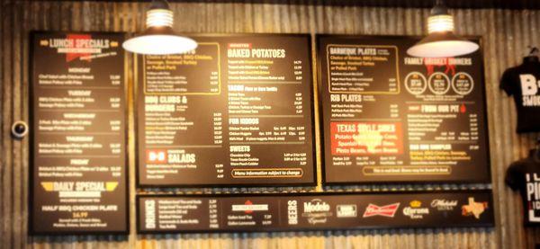 Menu on the wall above registers