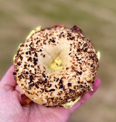 Bacon egg and cheese on an onion bagel