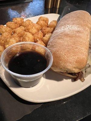 Philly cheesesteak and tater tots