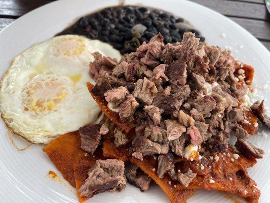 Chilaquiles Rojos with meat asada