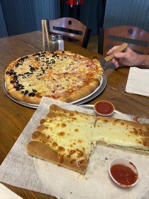 XL pizza and cheesebread.