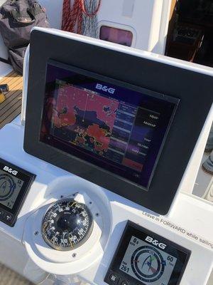 New chartplotter with custom black bezel and new Triton2 displays on binnacle installed by Simon