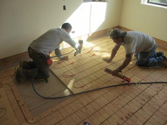 Radiant Heat flooring being installed by Kelly Plumbing & Heating in Mill Valley, CA.