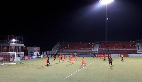 The soccer field. Phoenix Rising (in black) vs San Diego Loyal (in orange). View from front row seats. They have season packages.