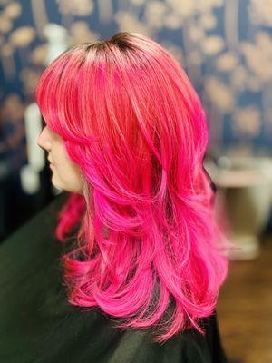 Beautiful hot pink with layers and curtain bangs