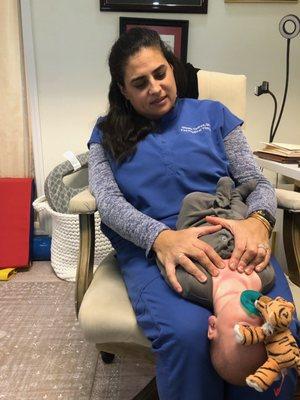 Dr Gigi helps melt away the tension in the neck so baby can be more comfortable and eat, breathe and sleep better