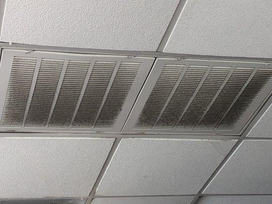 Dirty air vents in the ceiling