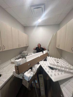 Are awesome dental assistant unpacking our equipment before we opened 
Date: 07/2023