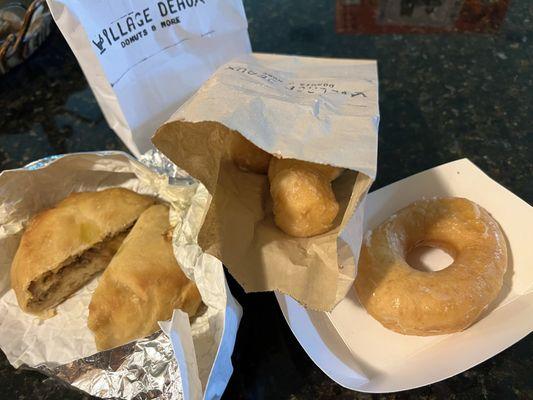 Boudin stuffed bread, donut holes, glazed donut.