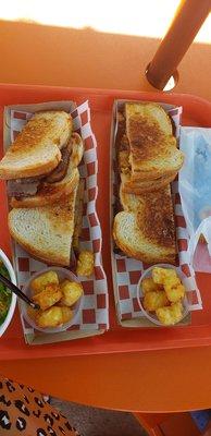 BBQ Brisket melts with sides of tater tots