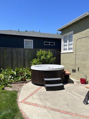 Voila! Beautiful hot tub in its new home