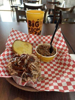 Pulled pork sandwich, baked beans and the big yellow cup!