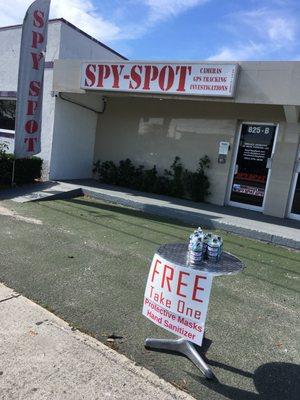 Spy Spot giving out for free Alcohol Gel and protective face mask